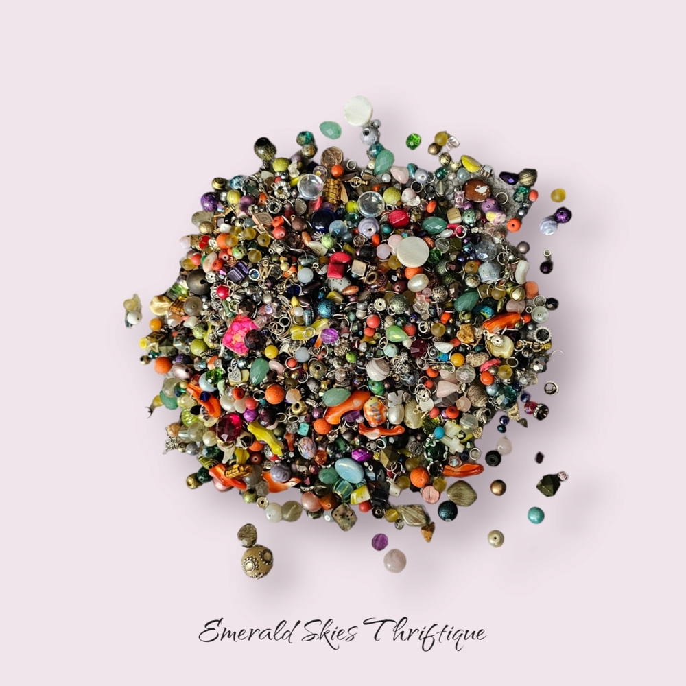 3.5 lbs of various beads‎
